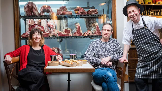 Chloe Scott-Moncrieff with her dining companion, Oli and master butcher Andy Cook at the butcher's Tap
